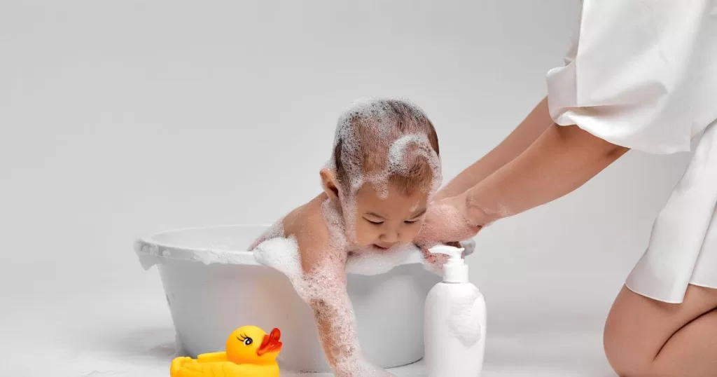 Cute Baby Taking a Bath